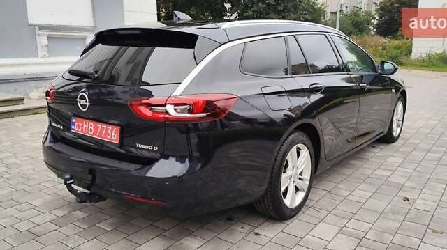 Синий Опель Инсигния, объемом двигателя 1.6 л и пробегом 285 тыс. км за 12899 $, фото 5 на Automoto.ua