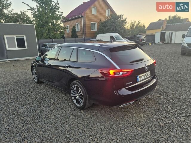 Синий Опель Инсигния, объемом двигателя 2 л и пробегом 235 тыс. км за 14600 $, фото 6 на Automoto.ua