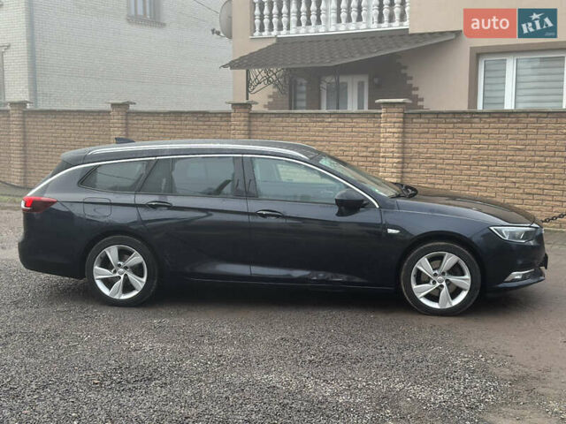 Синий Опель Инсигния, объемом двигателя 2 л и пробегом 280 тыс. км за 10999 $, фото 3 на Automoto.ua