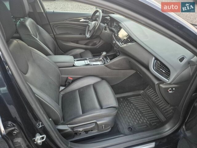 Синий Опель Инсигния, объемом двигателя 2 л и пробегом 235 тыс. км за 14600 $, фото 26 на Automoto.ua