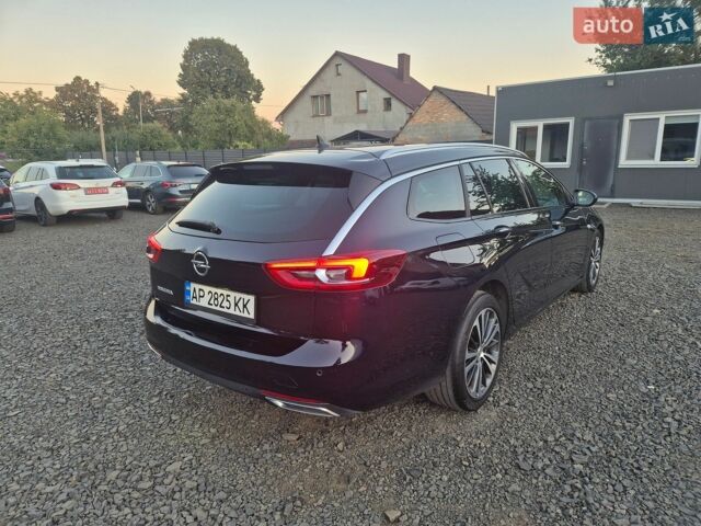 Синий Опель Инсигния, объемом двигателя 2 л и пробегом 235 тыс. км за 14600 $, фото 4 на Automoto.ua