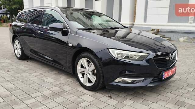 Синий Опель Инсигния, объемом двигателя 1.6 л и пробегом 285 тыс. км за 12899 $, фото 2 на Automoto.ua
