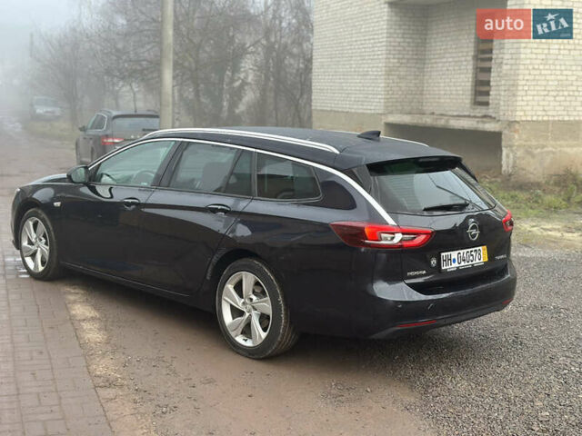 Синий Опель Инсигния, объемом двигателя 2 л и пробегом 280 тыс. км за 10999 $, фото 6 на Automoto.ua