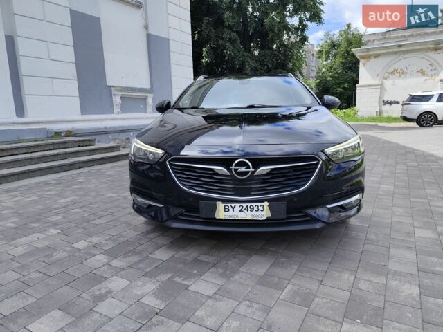 Синий Опель Инсигния, объемом двигателя 2 л и пробегом 297 тыс. км за 12499 $, фото 2 на Automoto.ua