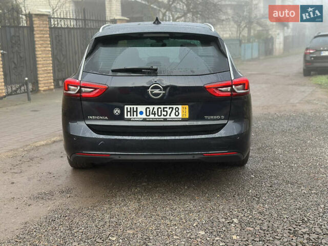 Синий Опель Инсигния, объемом двигателя 2 л и пробегом 280 тыс. км за 10999 $, фото 5 на Automoto.ua