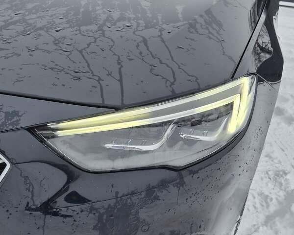 Синій Опель Інсігнія, об'ємом двигуна 2 л та пробігом 201 тис. км за 16599 $, фото 11 на Automoto.ua