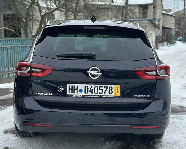 Синий Опель Инсигния, объемом двигателя 2 л и пробегом 282 тыс. км за 12999 $, фото 9 на Automoto.ua