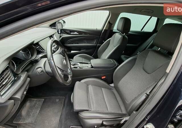 Синій Опель Інсігнія, об'ємом двигуна 1.6 л та пробігом 165 тис. км за 14700 $, фото 5 на Automoto.ua