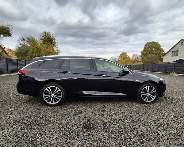 Синий Опель Инсигния, объемом двигателя 2 л и пробегом 201 тыс. км за 16500 $, фото 4 на Automoto.ua