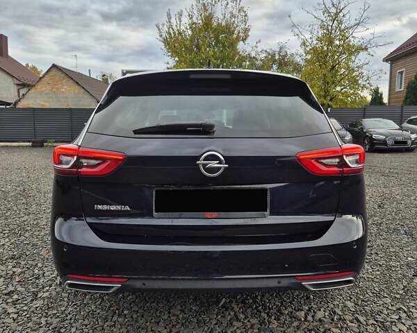 Синий Опель Инсигния, объемом двигателя 2 л и пробегом 201 тыс. км за 16500 $, фото 6 на Automoto.ua