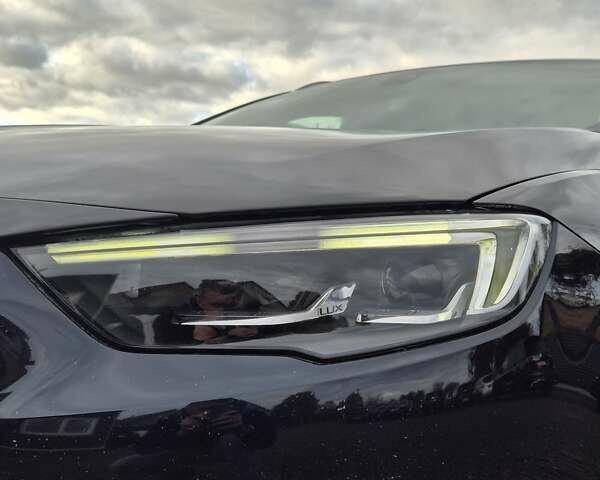 Синий Опель Инсигния, объемом двигателя 2 л и пробегом 201 тыс. км за 16500 $, фото 9 на Automoto.ua