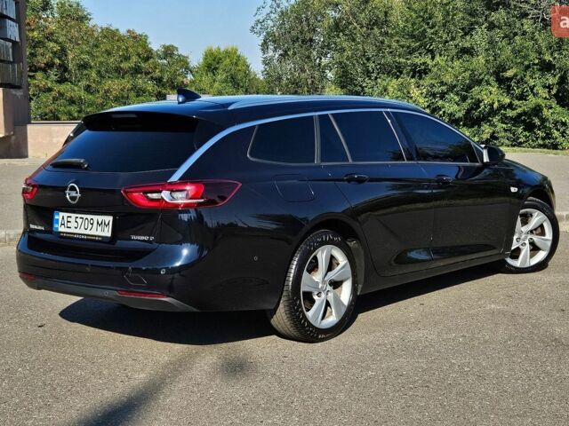 Синий Опель Инсигния, объемом двигателя 2 л и пробегом 135 тыс. км за 16000 $, фото 6 на Automoto.ua