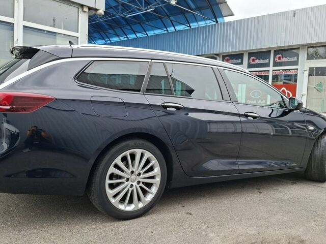 Синій Опель Інсігнія, об'ємом двигуна 1.6 л та пробігом 165 тис. км за 14700 $, фото 5 на Automoto.ua