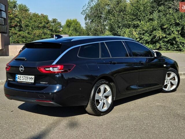 Синий Опель Инсигния, объемом двигателя 2 л и пробегом 135 тыс. км за 16000 $, фото 5 на Automoto.ua
