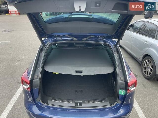 Синій Опель Інсігнія, об'ємом двигуна 1.5 л та пробігом 155 тис. км за 18321 $, фото 4 на Automoto.ua