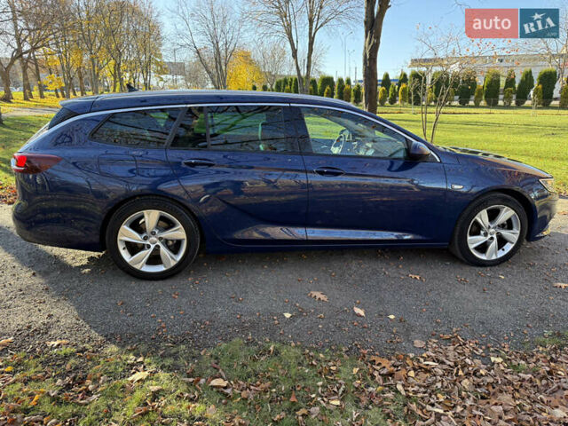 Синій Опель Інсігнія, об'ємом двигуна 1.6 л та пробігом 156 тис. км за 15500 $, фото 6 на Automoto.ua