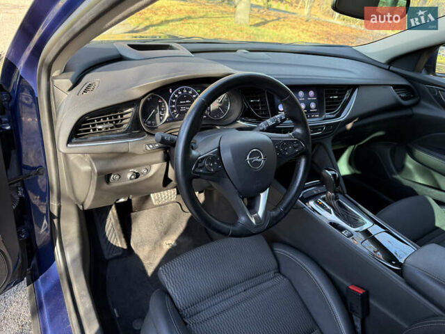Синий Опель Инсигния, объемом двигателя 1.6 л и пробегом 156 тыс. км за 15500 $, фото 45 на Automoto.ua