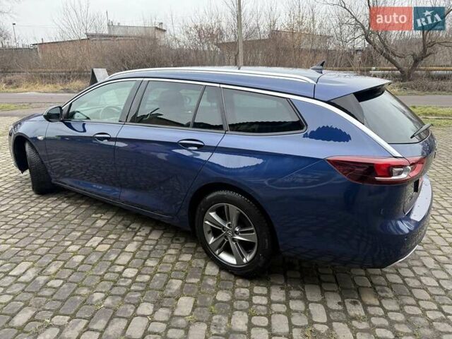 Синій Опель Інсігнія, об'ємом двигуна 2 л та пробігом 79 тис. км за 19500 $, фото 6 на Automoto.ua