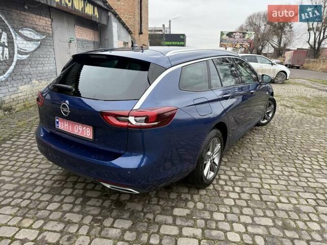 Синій Опель Інсігнія, об'ємом двигуна 2 л та пробігом 79 тис. км за 19500 $, фото 4 на Automoto.ua