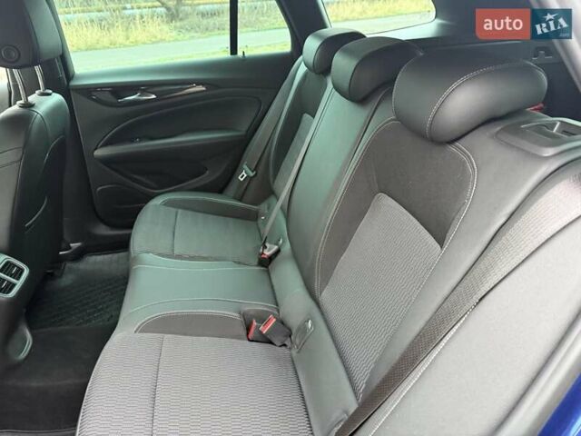 Синій Опель Інсігнія, об'ємом двигуна 2 л та пробігом 79 тис. км за 19500 $, фото 20 на Automoto.ua