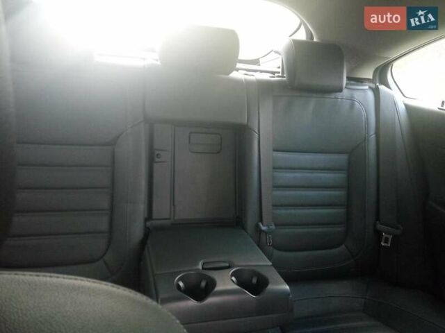 Синій Опель Інсігнія, об'ємом двигуна 1.96 л та пробігом 245 тис. км за 9500 $, фото 3 на Automoto.ua