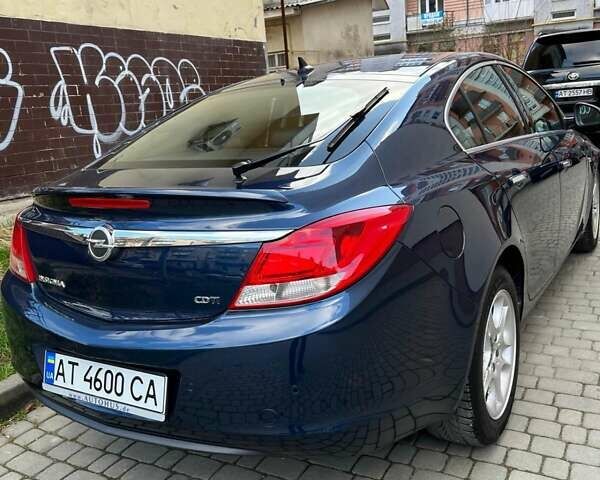 Синій Опель Інсігнія, об'ємом двигуна 1.96 л та пробігом 245 тис. км за 9500 $, фото 1 на Automoto.ua