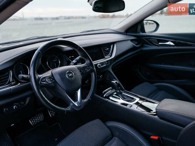 Синій Опель Інсігнія, об'ємом двигуна 2 л та пробігом 242 тис. км за 16500 $, фото 37 на Automoto.ua