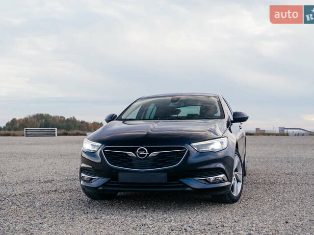 Синій Опель Інсігнія, об'ємом двигуна 2 л та пробігом 200 тис. км за 16500 $, фото 1 на Automoto.ua