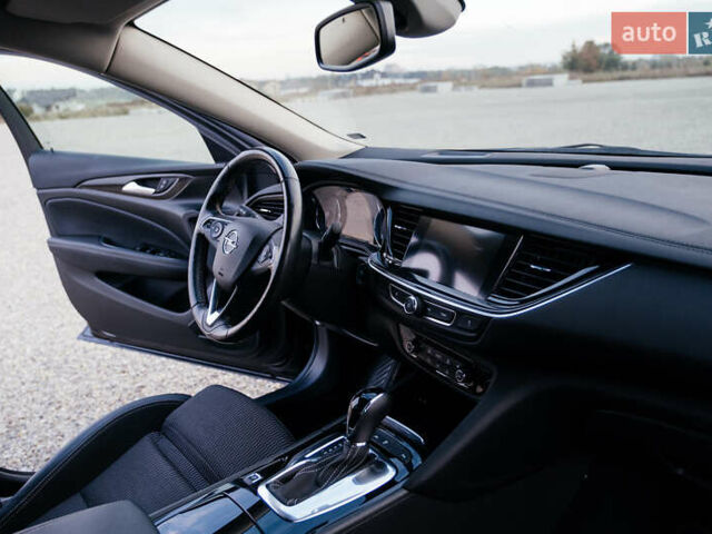 Синій Опель Інсігнія, об'ємом двигуна 2 л та пробігом 200 тис. км за 16500 $, фото 45 на Automoto.ua