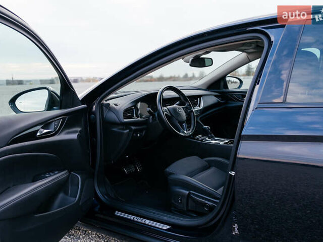 Синій Опель Інсігнія, об'ємом двигуна 2 л та пробігом 200 тис. км за 16500 $, фото 30 на Automoto.ua