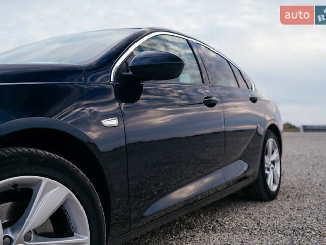 Синій Опель Інсігнія, об'ємом двигуна 2 л та пробігом 242 тис. км за 16500 $, фото 5 на Automoto.ua