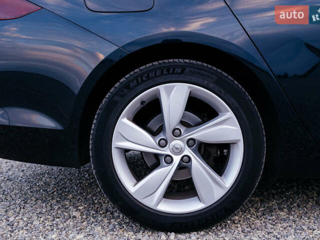 Синій Опель Інсігнія, об'ємом двигуна 2 л та пробігом 200 тис. км за 16500 $, фото 80 на Automoto.ua