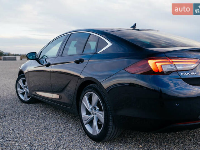 Синій Опель Інсігнія, об'ємом двигуна 2 л та пробігом 242 тис. км за 16500 $, фото 26 на Automoto.ua
