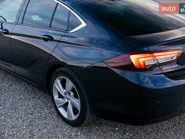 Синій Опель Інсігнія, об'ємом двигуна 2 л та пробігом 242 тис. км за 16500 $, фото 25 на Automoto.ua