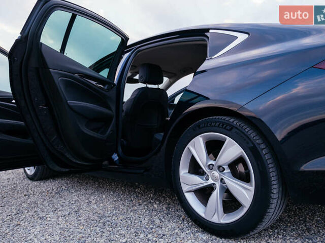 Синий Опель Инсигния, объемом двигателя 2 л и пробегом 242 тыс. км за 16500 $, фото 73 на Automoto.ua