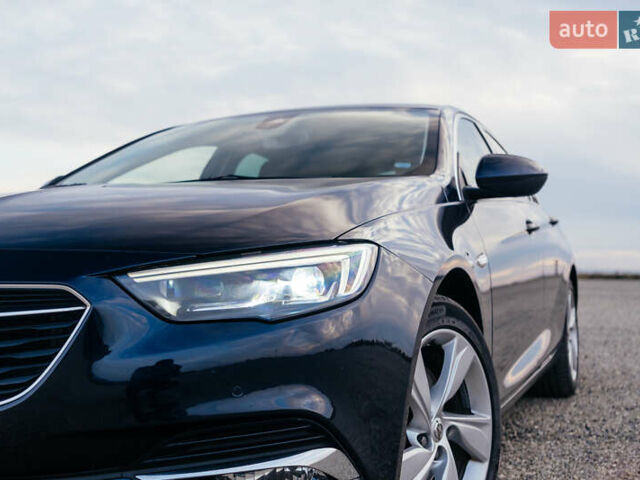 Синій Опель Інсігнія, об'ємом двигуна 2 л та пробігом 242 тис. км за 16500 $, фото 2 на Automoto.ua