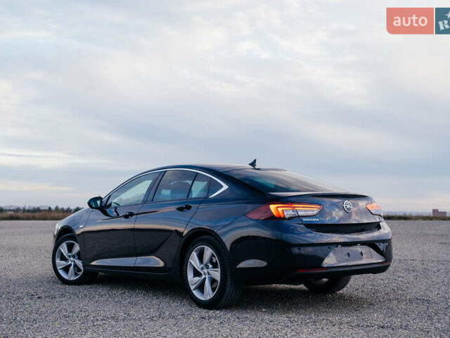 Синій Опель Інсігнія, об'ємом двигуна 2 л та пробігом 200 тис. км за 16500 $, фото 19 на Automoto.ua