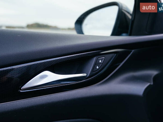 Синій Опель Інсігнія, об'ємом двигуна 2 л та пробігом 200 тис. км за 16500 $, фото 35 на Automoto.ua