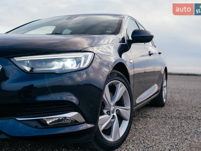 Синий Опель Инсигния, объемом двигателя 2 л и пробегом 242 тыс. км за 16500 $, фото 3 на Automoto.ua