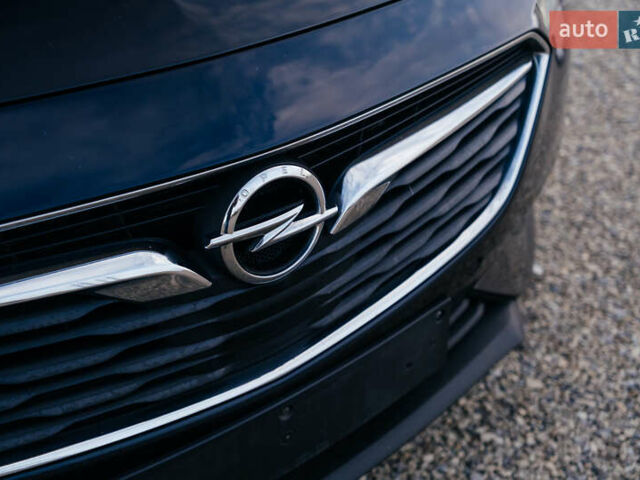 Синий Опель Инсигния, объемом двигателя 2 л и пробегом 242 тыс. км за 16500 $, фото 5 на Automoto.ua