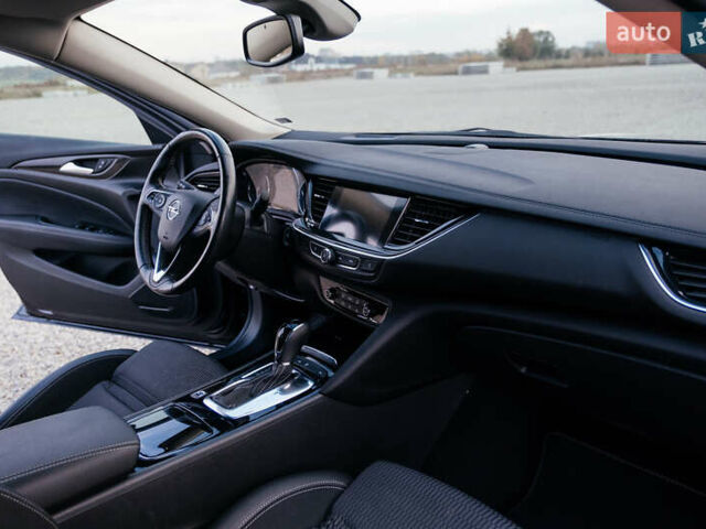 Синій Опель Інсігнія, об'ємом двигуна 2 л та пробігом 242 тис. км за 16500 $, фото 41 на Automoto.ua