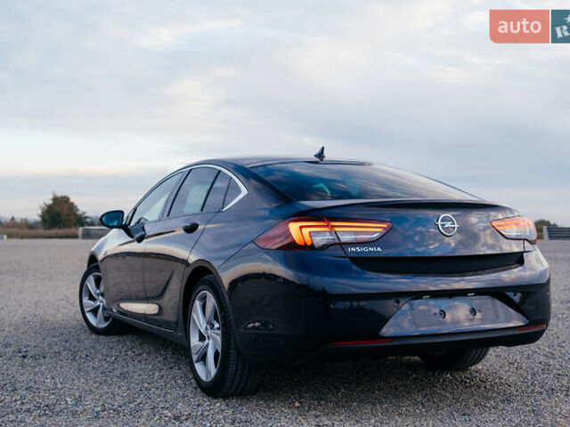 Синій Опель Інсігнія, об'ємом двигуна 2 л та пробігом 200 тис. км за 16500 $, фото 20 на Automoto.ua