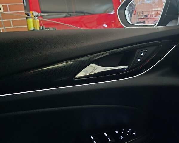 Синій Опель Інсігнія, об'ємом двигуна 2 л та пробігом 124 тис. км за 21500 $, фото 31 на Automoto.ua