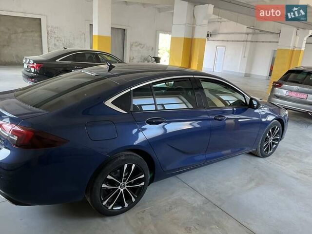 Синий Опель Инсигния, объемом двигателя 2 л и пробегом 119 тыс. км за 18900 $, фото 6 на Automoto.ua