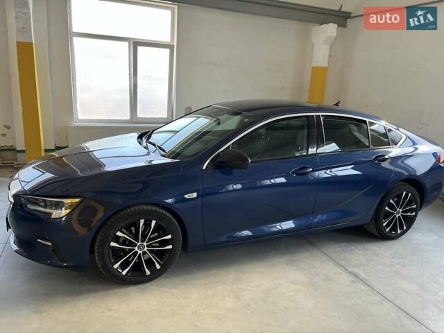 Синий Опель Инсигния, объемом двигателя 2 л и пробегом 119 тыс. км за 18900 $, фото 5 на Automoto.ua