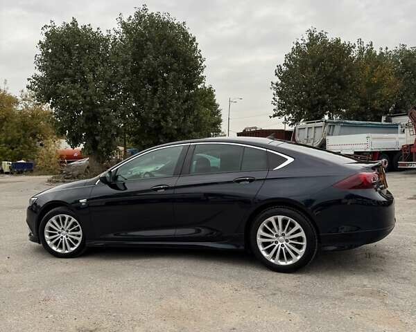 Синий Опель Инсигния, объемом двигателя 1.6 л и пробегом 170 тыс. км за 18500 $, фото 3 на Automoto.ua