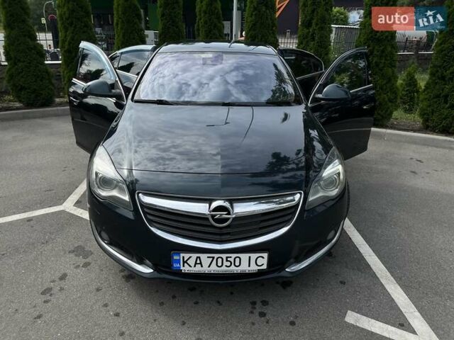 Зеленый Опель Инсигния, объемом двигателя 2 л и пробегом 150 тыс. км за 13600 $, фото 1 на Automoto.ua