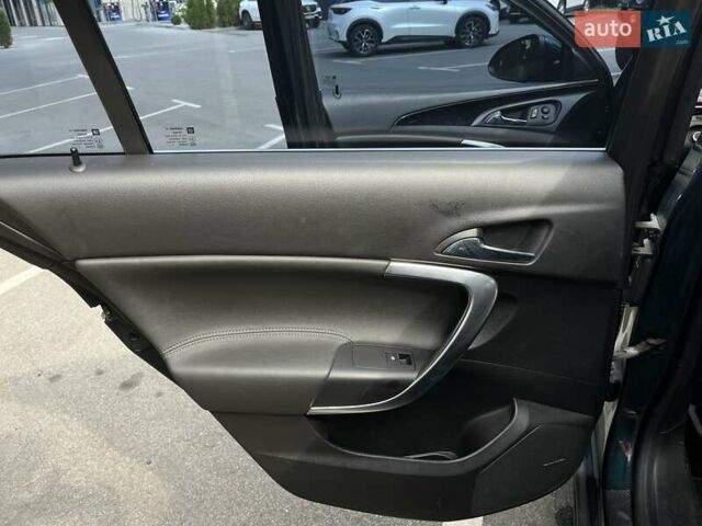 Зеленый Опель Инсигния, объемом двигателя 2 л и пробегом 150 тыс. км за 13600 $, фото 9 на Automoto.ua