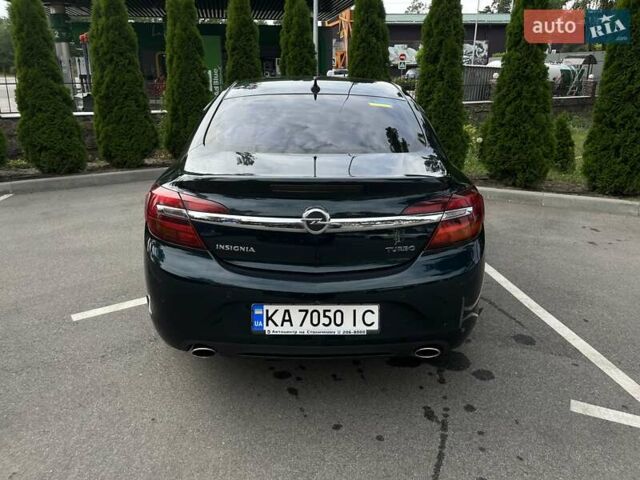 Зеленый Опель Инсигния, объемом двигателя 2 л и пробегом 150 тыс. км за 13600 $, фото 4 на Automoto.ua