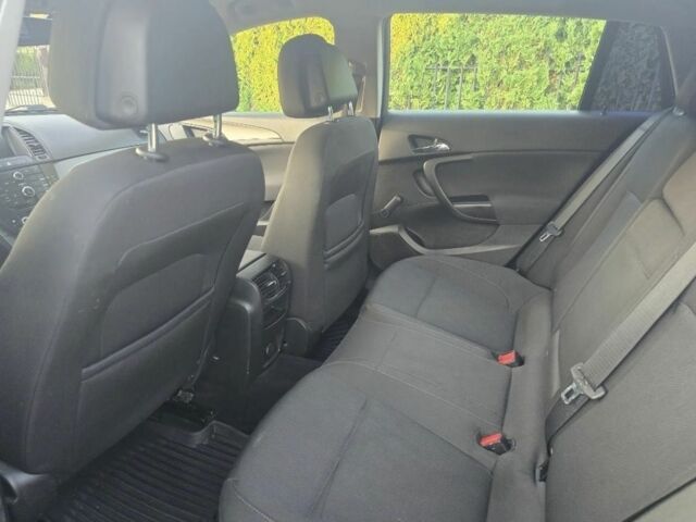 Зеленый Опель Инсигния, объемом двигателя 2 л и пробегом 236 тыс. км за 1900 $, фото 8 на Automoto.ua